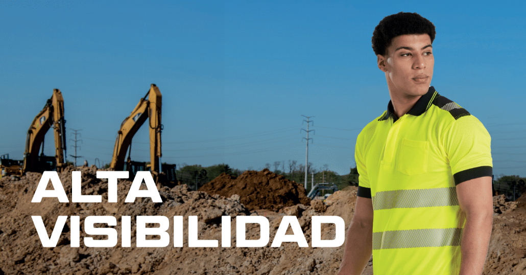 Trabajadores con un polo amarillo de advertencia frente a un fondo de construcción con grúas naranjas, líneas eléctricas y montículos de tierra. Las letras blancas dicen "Alta visibilidad". Enlace a nuestra colección de protección de advertencia.