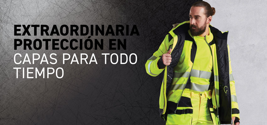 Hombre barbudo con ropa de alta visibilidad multicapa para todo clima.